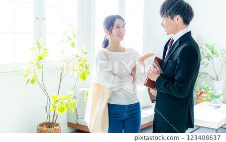 Property viewing young woman 123408637