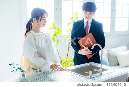 Property viewing young woman 123408640