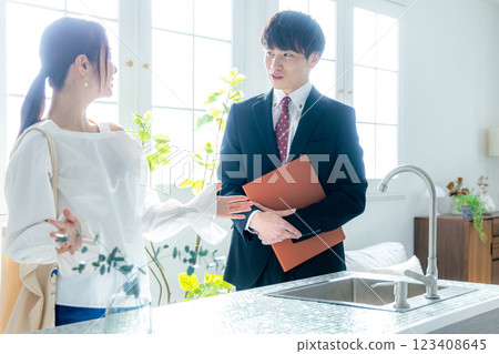 Property viewing young woman Property viewing young woman 123408645