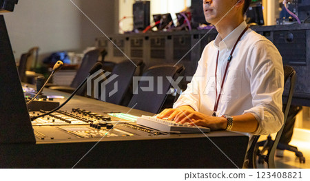 A man working at a TV station A man working at a TV station 123408821