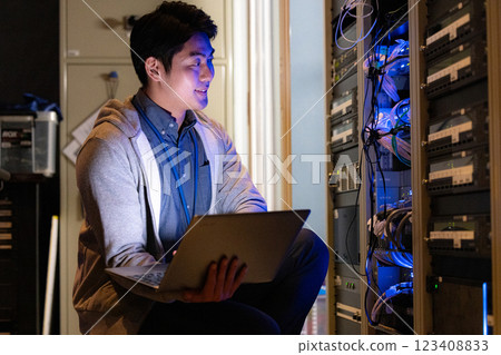 Server room male engineer 123408833