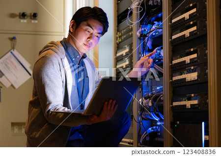 Server room male engineer 123408836