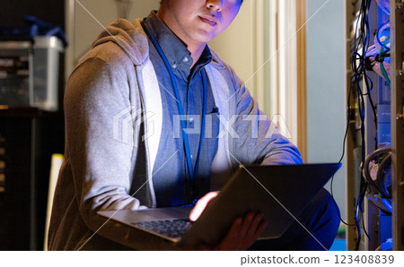 Server room male engineer 123408839