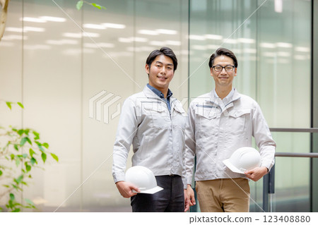 Staff of workers working in an office building 123408880