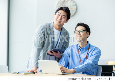 Men working in the office Men working in the office 123408918