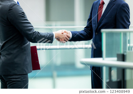 A businessman shaking hands A businessman shaking hands 123408949