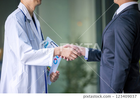 Doctors shaking hands in hospital Doctors shaking hands in hospital 123409037