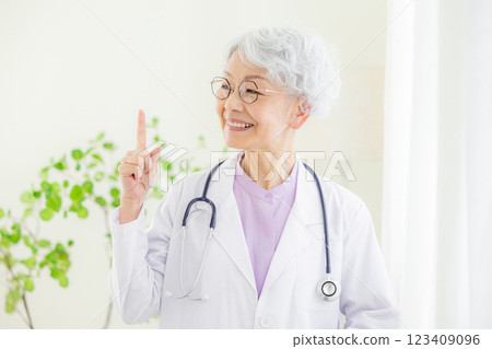 Veteran senior female doctor 123409096