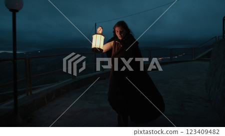 Mysterious Woman Searches for Her Missing Friend at Night in the Square Mysterious Woman Searches for Her Missing Friend at Night in the Square 123409482