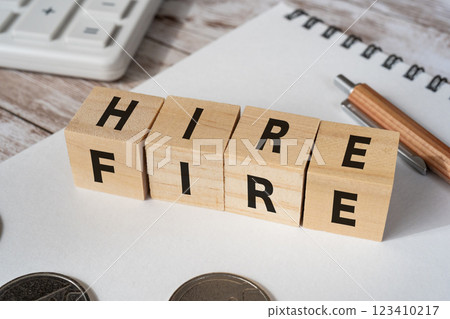 Blocks with "HIRE" and "FIRE" written on them Blocks with "HIRE" and "FIRE" written on them 123410217