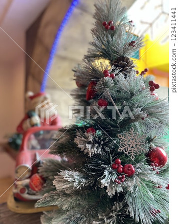Christmas ornaments on a Christmas tree 123411441