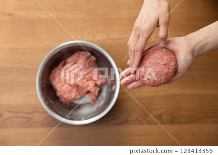 Hamburger being cooked Hamburger being cooked 123413356
