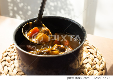 Curry in a pot 123413372