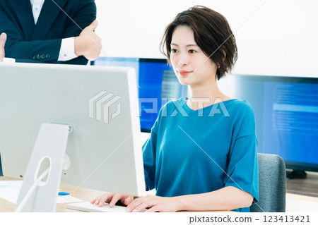 Businesswoman receiving advice from her boss 123413421