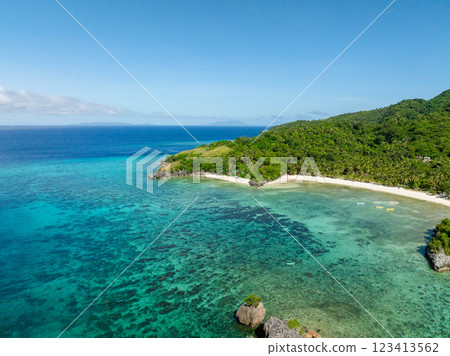 Transparent turquoise sea water with corals in Cobrador Island. Romblon, Philippines. Transparent turquoise sea water with corals in Cobrador Island. Romblon, Philippines. 123413562