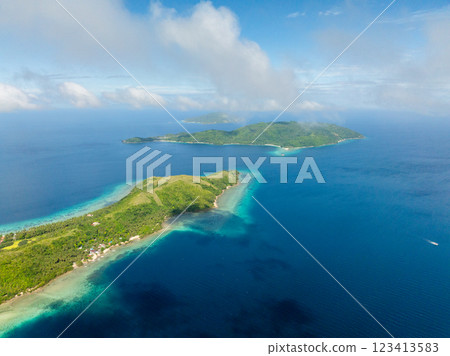 Tropical scenery of Islands with beach and blue sea. Blue sky and clouds. Romblon, Philippines. 123413583