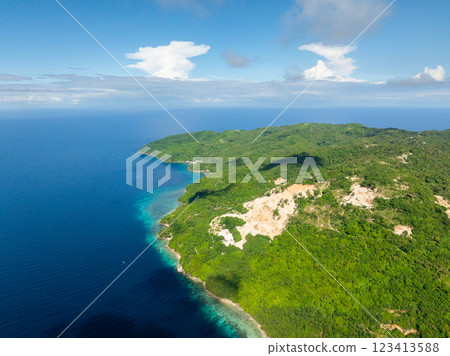 Blue sea in Romblon Island with green plants. Blue sky and clouds. Philippines. Blue sea in Romblon Island with green plants. Blue sky and clouds. Philippines. 123413588