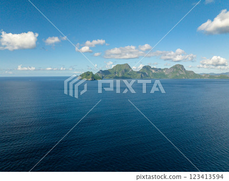 Helicopter Island and Cadlao Island with blue sea. Blue sky and clouds. El Nido, Philippines. 123413594