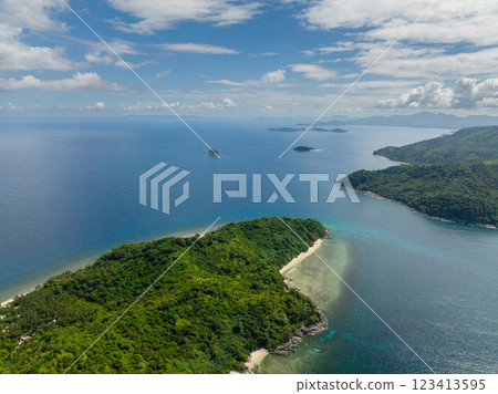 Tropical Islands with beaches. Blue sea under blue sky and clouds. El Nido. Palawan, Philippines. Tropical Islands with beaches. Blue sea under blue sky and clouds. El Nido. Palawan, Philippines. 123413595