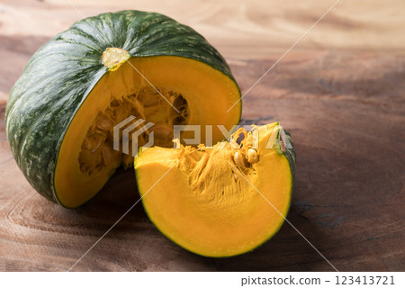 Green pumpkin on wooden background, Fresh vegetable, Food ingredient 123413721