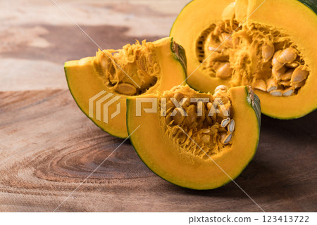 Green pumpkin on wooden background, Fresh vegetable, Food ingredient 123413722