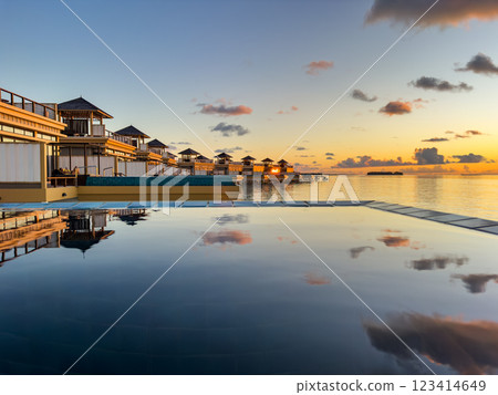 Sunset views from overwater pool villa in Maldives Sunset views from overwater pool villa in Maldives 123414649