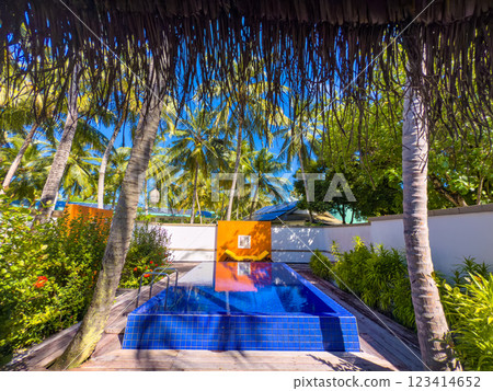 Sunset views from overwater pool villa in Maldives Sunset views from overwater pool villa in Maldives 123414652
