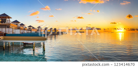 Sunset views from overwater pool villa in Maldives Sunset views from overwater pool villa in Maldives 123414670