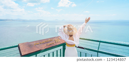 Woman tourist traveling in Krabi, Thailand. happy traveller enjoy and sightseeing view at koh Hong island viewpoint. summer trip, destination, Southeast Asia Travel, vacation and holiday concept 123414807