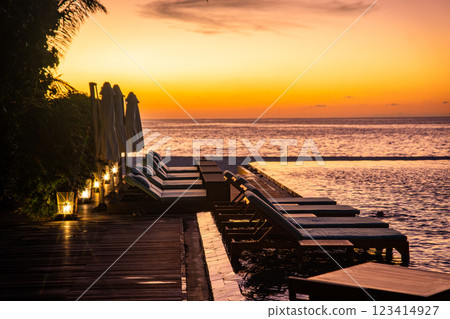 Sunset views from overwater pool villa in Maldives Sunset views from overwater pool villa in Maldives 123414927