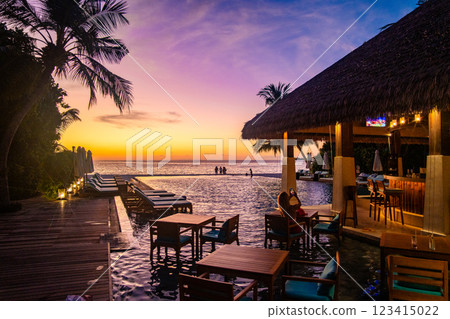 Pool bar at night in the Maldives, Asia 123415022