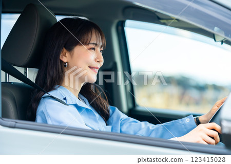 Car and driver Woman driving a car Woman in a car Car and driver Woman driving a car Woman in a car 123415028