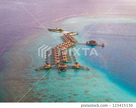 Aerial views of Velavaru Island at sunset in Maldives Aerial views of Velavaru Island at sunset in Maldives 123415130