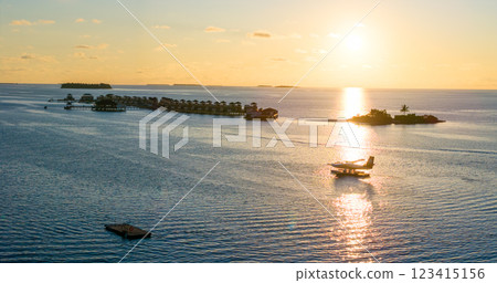 Aerial views of Velavaru Island at sunset in Maldives Aerial views of Velavaru Island at sunset in Maldives 123415156