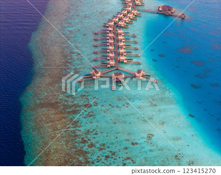 Aerial views of Velavaru Island at sunset in Maldives Aerial views of Velavaru Island at sunset in Maldives 123415270