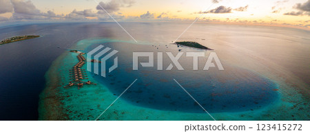 Aerial views of Velavaru Island at sunset in Maldives Aerial views of Velavaru Island at sunset in Maldives 123415272