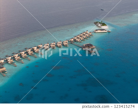 Aerial views of Velavaru Island at sunset in Maldives Aerial views of Velavaru Island at sunset in Maldives 123415274