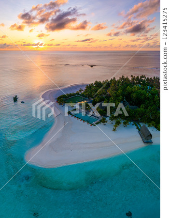 Aerial views of Velavaru Island at sunset in Maldives Aerial views of Velavaru Island at sunset in Maldives 123415275