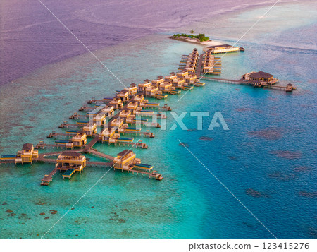 Aerial views of Velavaru Island at sunset in Maldives Aerial views of Velavaru Island at sunset in Maldives 123415276
