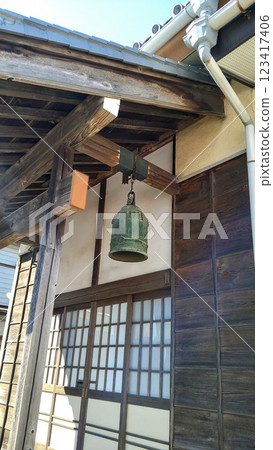 Bells in an old wooden building 123417406