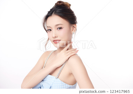 Beautiful young asian woman with clean fresh skin on white background, Face care, Facial treatment, Cosmetology, beauty and spa, Asian women portrait. Beautiful young asian woman with clean fresh skin on white background, Face care, Facial treatment, Cosmetology, beauty and spa, Asian women portrait. 123417965