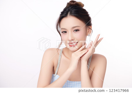 Beautiful young asian woman with clean fresh skin on white background, Face care, Facial treatment, Cosmetology, beauty and spa, Asian women portrait. Beautiful young asian woman with clean fresh skin on white background, Face care, Facial treatment, Cosmetology, beauty and spa, Asian women portrait. 123417966