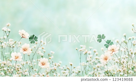 dreamy pastel floral background. delicate white flowers and green clover on a soft green backdrop. 123419088