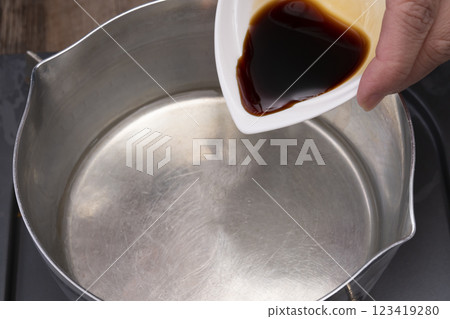 The process of making firefly squid and seaweed rice balls The process of making firefly squid and seaweed rice balls 123419280