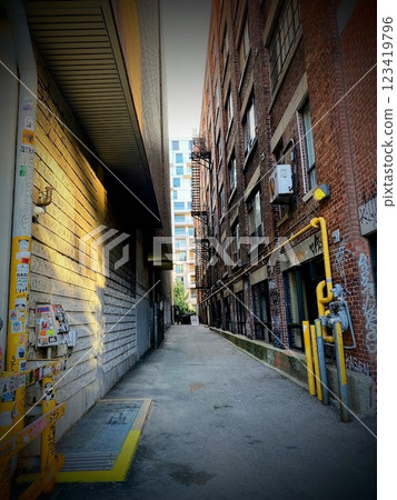 Evening view from the back alley Evening view from the back alley 123419796