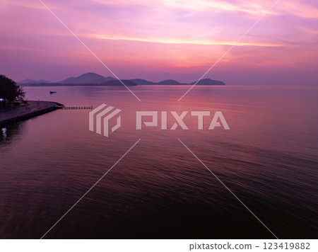 Colorful sunset or sunrise sky clouds over sea in Thailand, Amazing nature landscape seascape,Beautiful light nature landscape colorful sky background 123419882