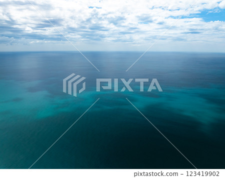 Aerial view of beautiful sea in summer season sky background,Drone view Waves water surface texture on sunny tropical ocean in Phuket island Thailand Aerial view of beautiful sea in summer season sky background,Drone view Waves water surface texture on sunny tropical ocean in Phuket island Thailand 123419902