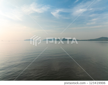 Aerial view of beautiful sea in summer season sky background,Drone view Waves water surface texture on sunny tropical ocean in Phuket island Thailand 123419906