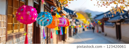 Colorful Korean street decorated with lanterns and Bok banners for a festival Colorful Korean street decorated with lanterns and Bok banners for a festival 123420061
