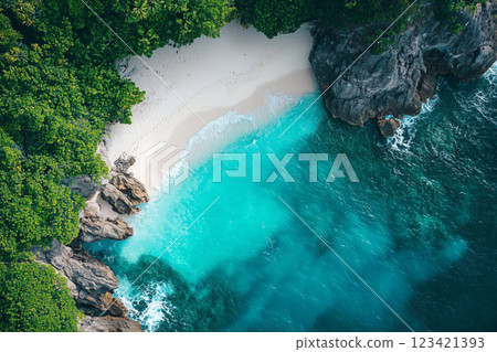 A hidden beach with emerald green water and white sand 123421393